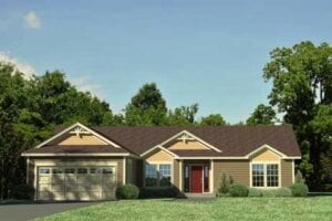 A yellow home with a garage